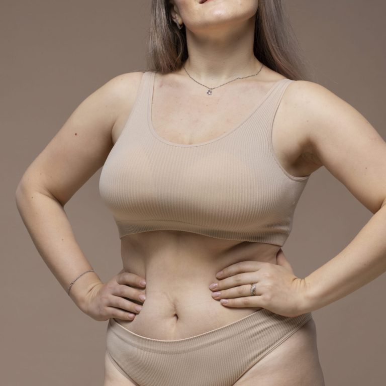 woman patient in the photo before breast reduction
